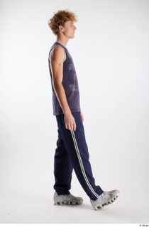 Urien  1 blue tank top blue track pants dressed…